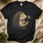 Hedgehog Enjoys Dandelion Spring Garden T-Shirt by Zen & Zucchinis Slow Garden Club